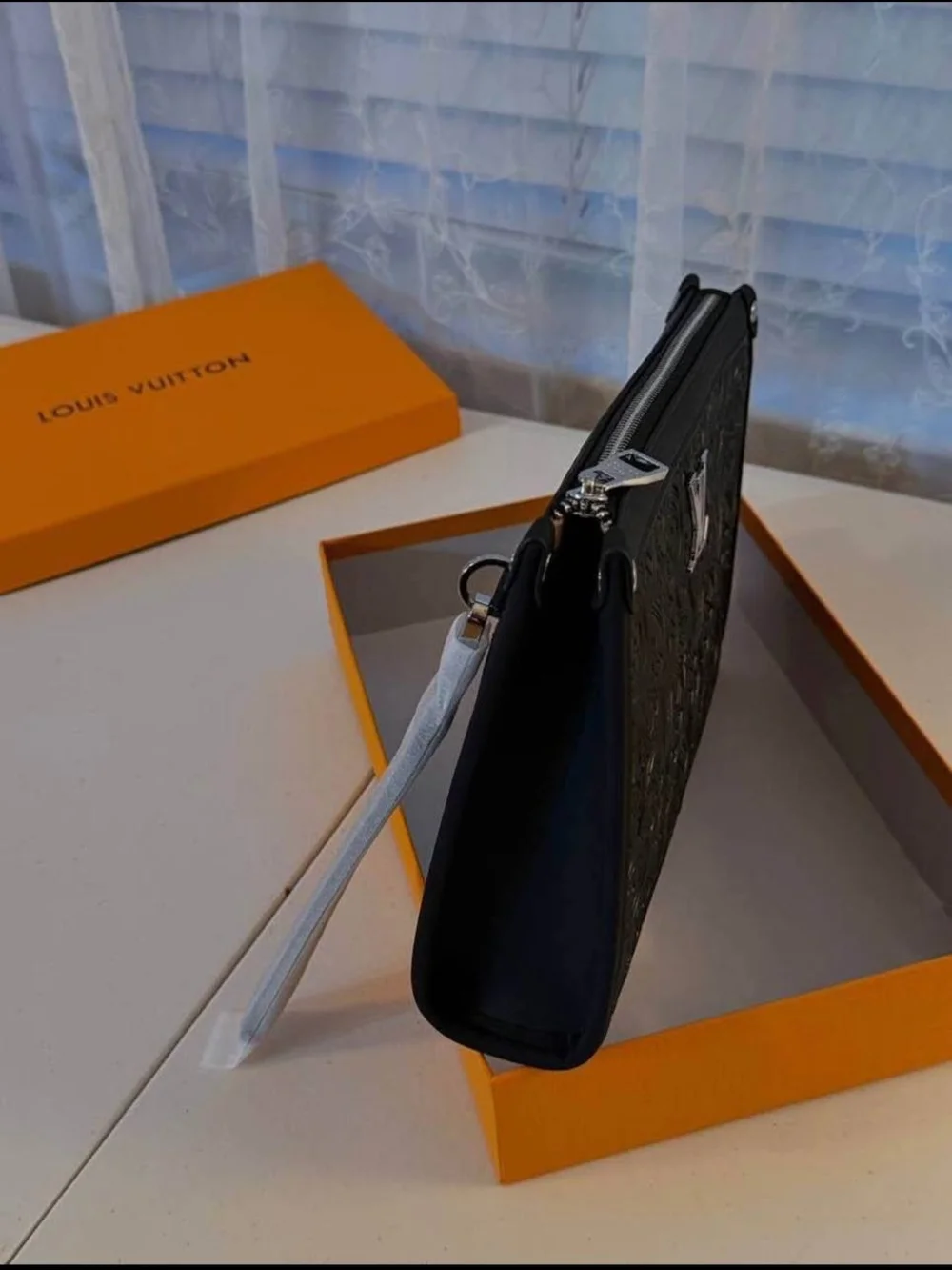 Louis Vuitton Black Embossed Monogram Pouch with Silver LV